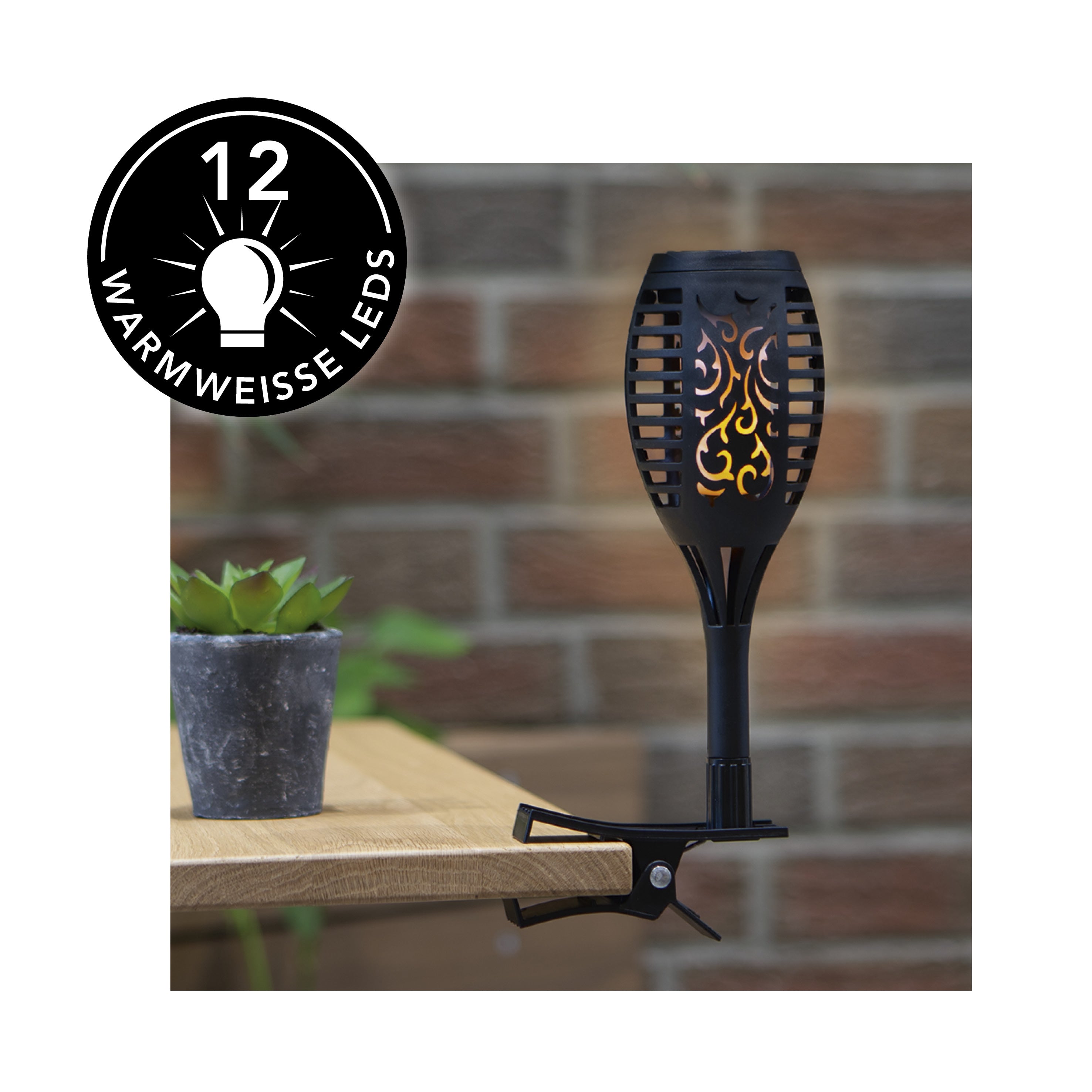 Solar-Fackel LED mit Tageslichtsensor - 2er-Set schwarz mit warmweißem Flammeneffekt und Clip zur Befestigung an Tisch oder Garten.