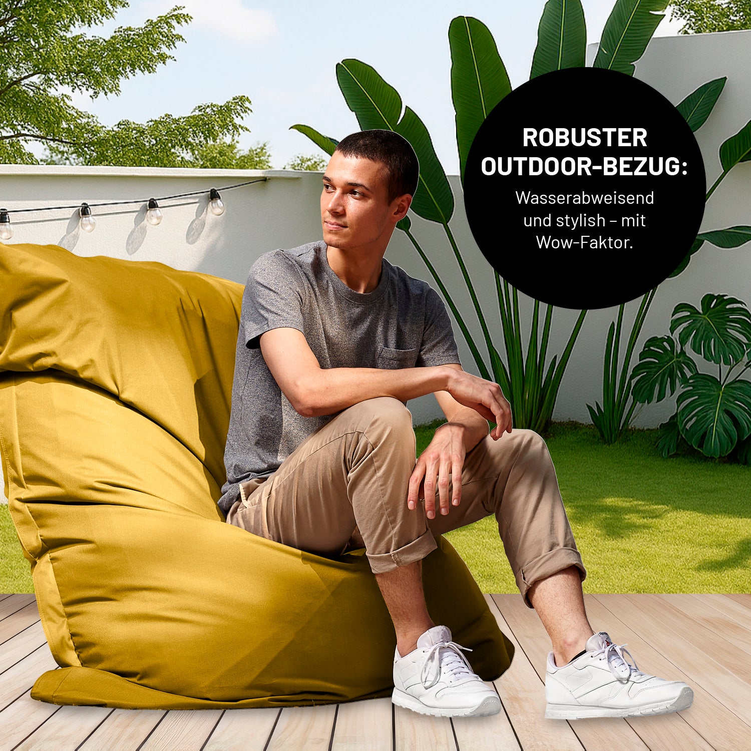 Mann sitzt entspannt auf Sitzsack Classic XXL All-in-One Set - 380 L - 140 x 180 cm - Senfgelb mit robustem Outdoor-Bezug
