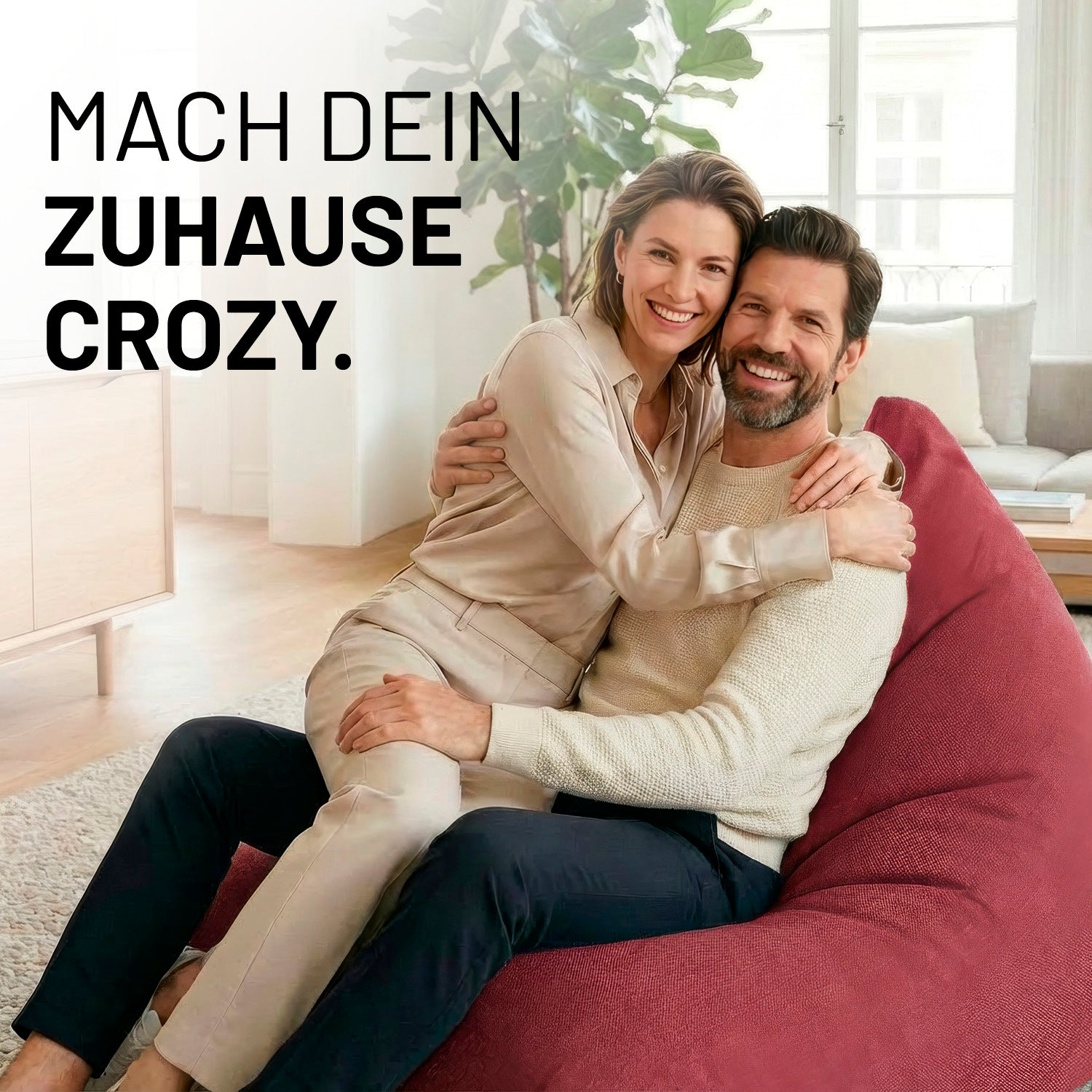 Paar sitzt entspannt auf dem roten Sitzsack Interior Line (370 L) - indoor - Rot in modernem Wohnzimmerambiente.