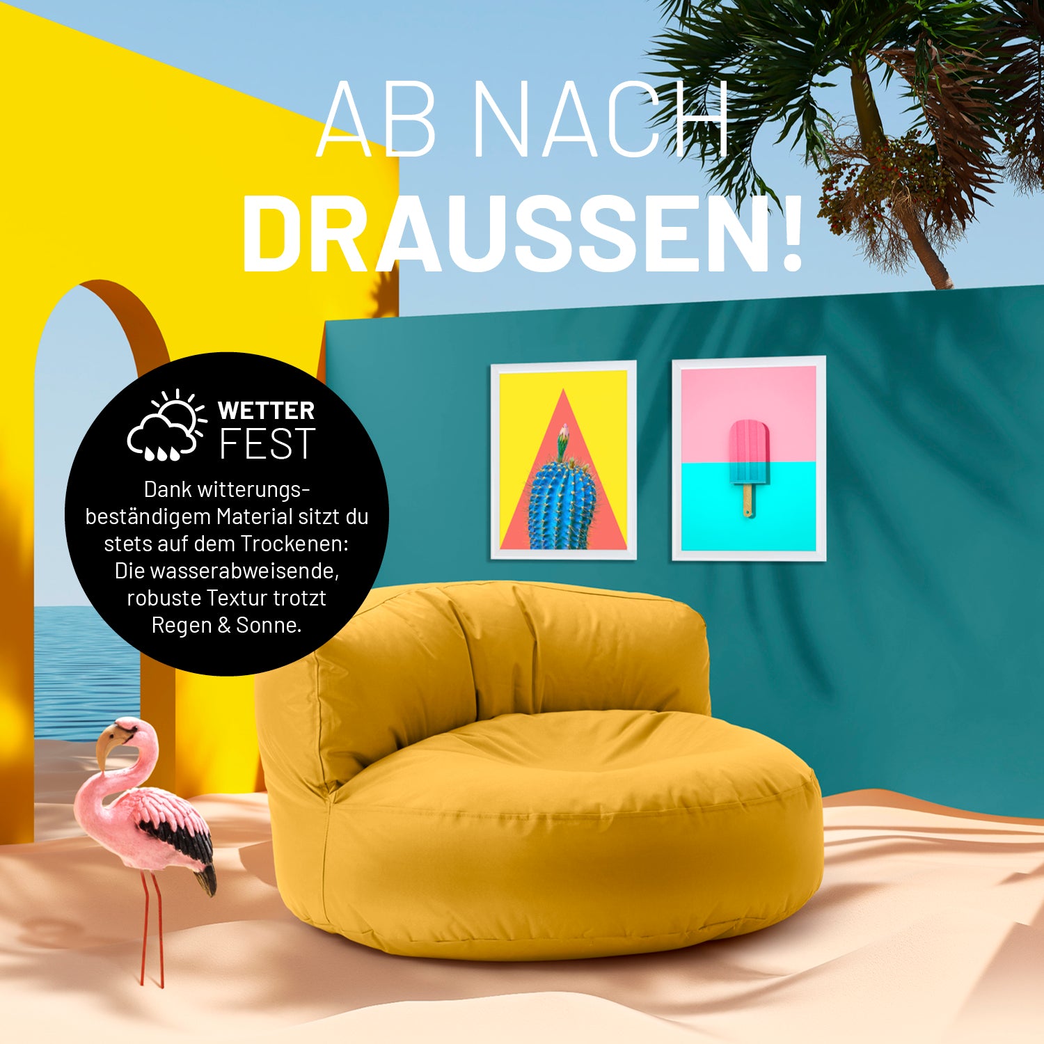 Sitzsack Lounge (320 L) - indoor & outdoor - Senfgelb auf Terrasse bei Sonne mit farbenfroher Wand und Flamingo-Dekor.