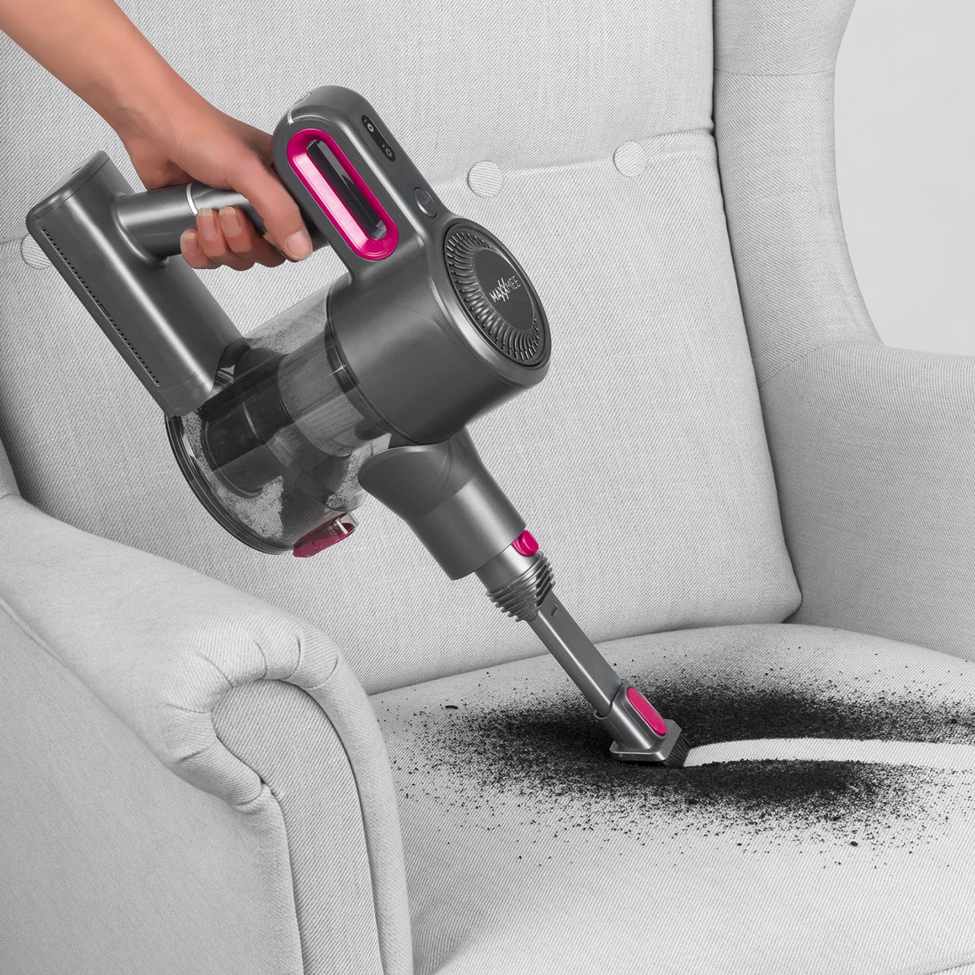 Akku-Zyklon-Staubsauger anthrazit/pink mit Verlängerungsrohr bis 80 cm reinigt tiefenwirksam Polsterschaumstoff.