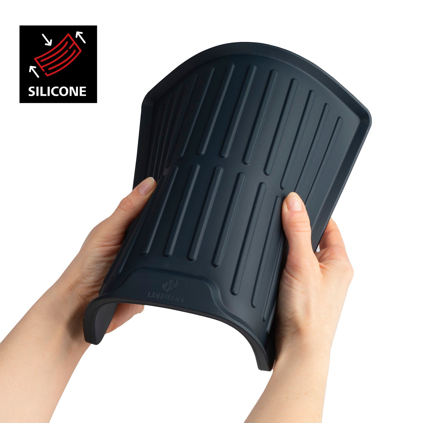 Flexibles schwarzes Silikonmatte für Schneidebrett mit Noppen, rutschfest und leicht zu reinigen, ideal für sauberes Arbeiten.