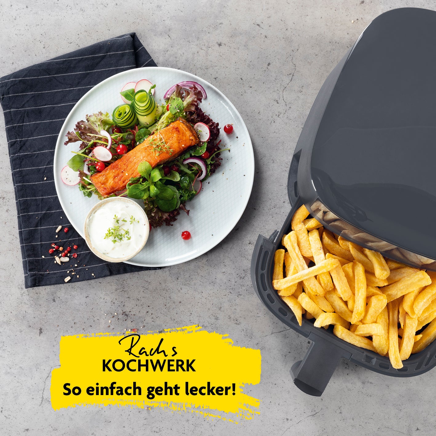 Heißluft-Fritteuse Digital 4,2l mit Erinnerungsfunktion zeigt knusprige Pommes und frisch gegrillten Lachs auf Teller.