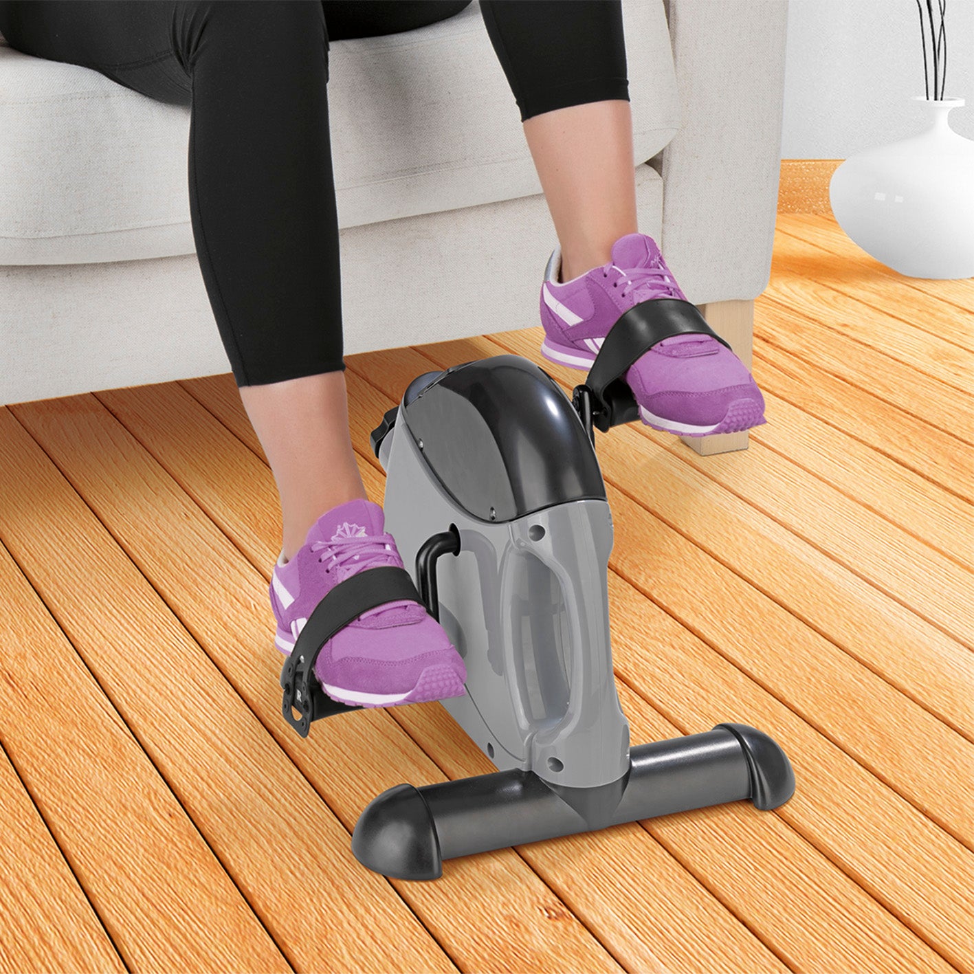 Mini-Trainer mit Metallschwungrad - grau/schwarz, kompakt für Arm- und Beintraining, inklusive Trainingscomputer und Widerstandsregulierung.