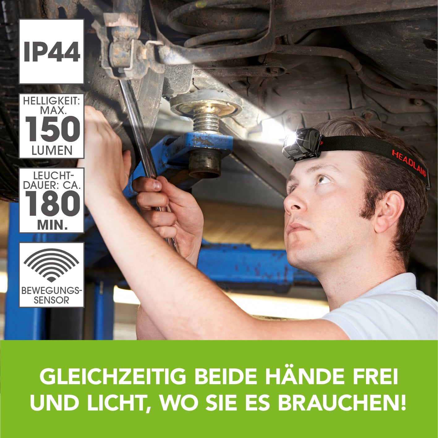 Mann arbeitet unter Auto mit Stirnlampe - schwarz/rot, Bewegungssensor, 150 Lumen, spritzwassergeschützt nach IP44