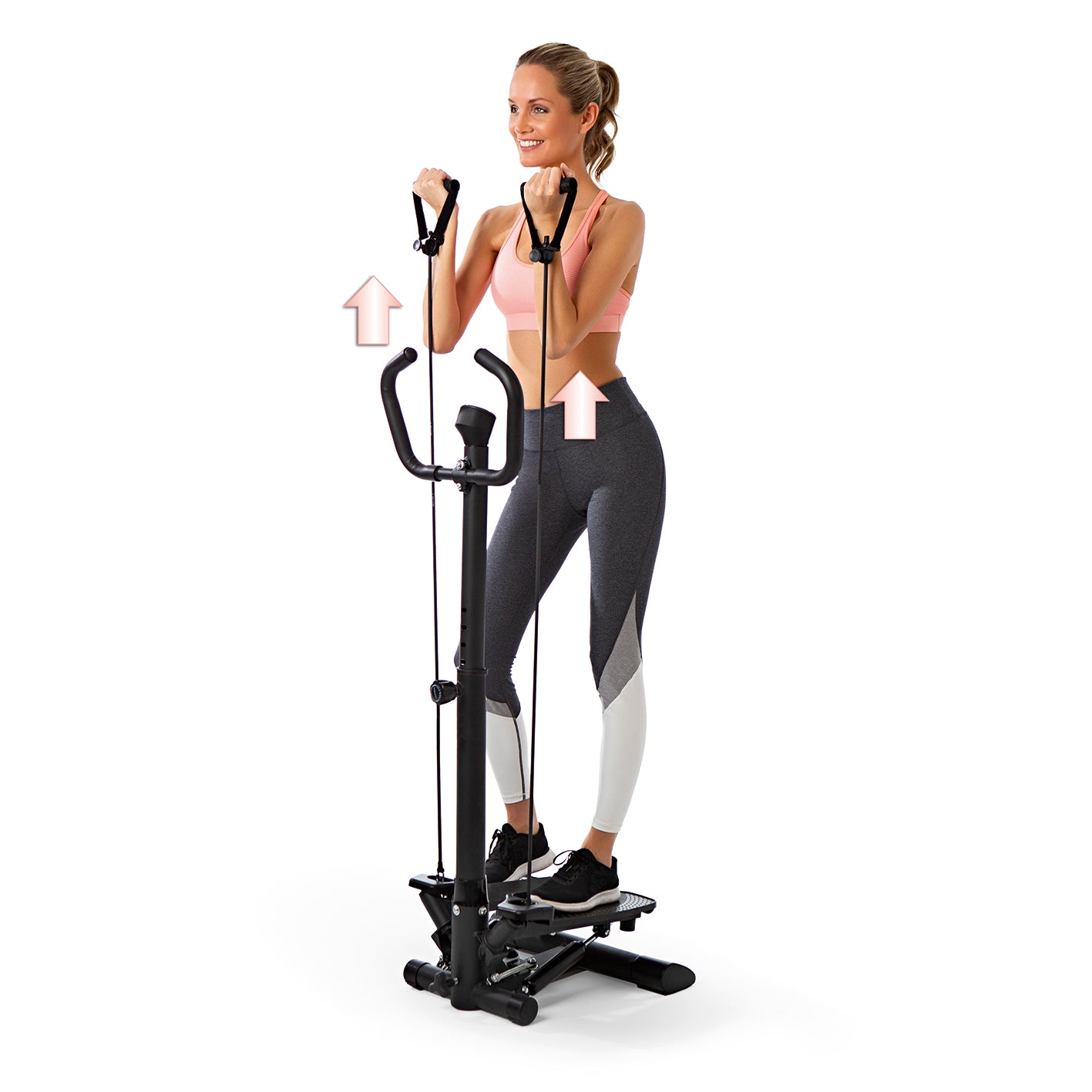 Frau trainiert mit Fitnesstrainer Swing Stepper mit 2 Expanderbändern für Beine, Arme und Ausdauer mit Trainingscomputer.